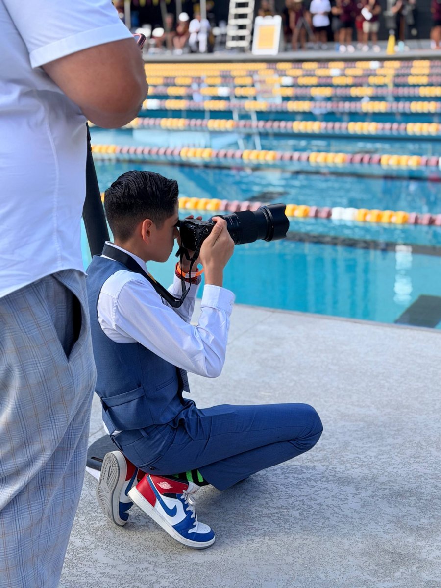 William Miller Jr. photographs the action from the pool deck during Bold World Media’s ASU vs. SMU coverage.